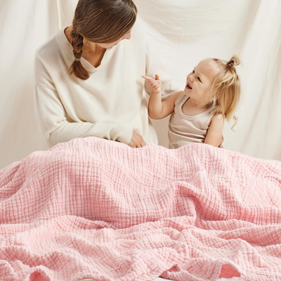 CozyHaven™ – Atmungsaktive Musselin-Decke