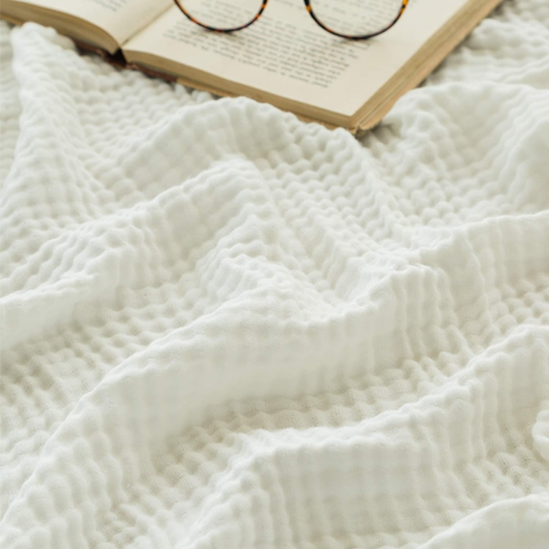 CozyHaven™ – Atmungsaktive Musselin-Decke